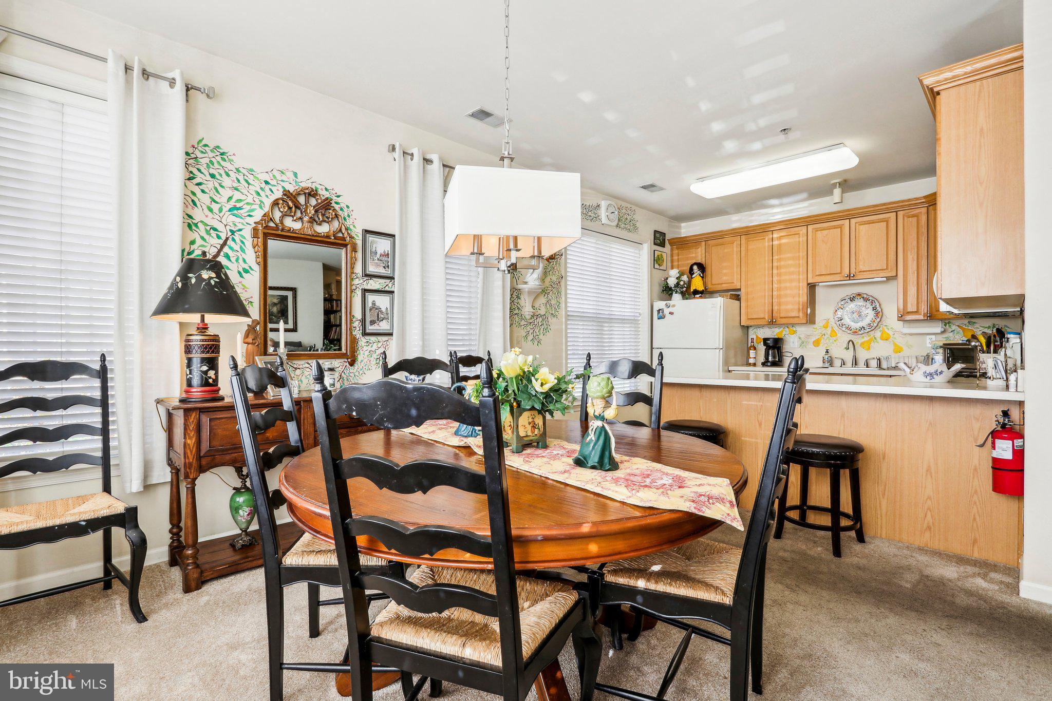 113 Kyle Way Ewing, NJ 08628 - Photo 14 of 42 a view of a dining room with furniture window and outside view