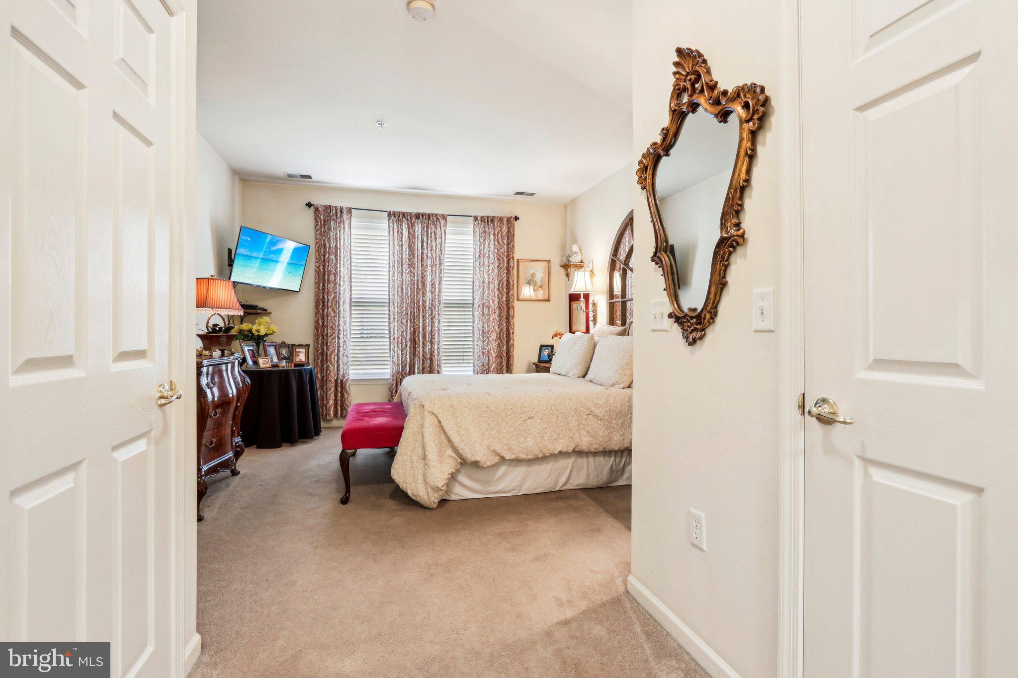 113 Kyle Way Ewing, NJ 08628 - Photo 29 of 42 a bed room with a bed and a chair