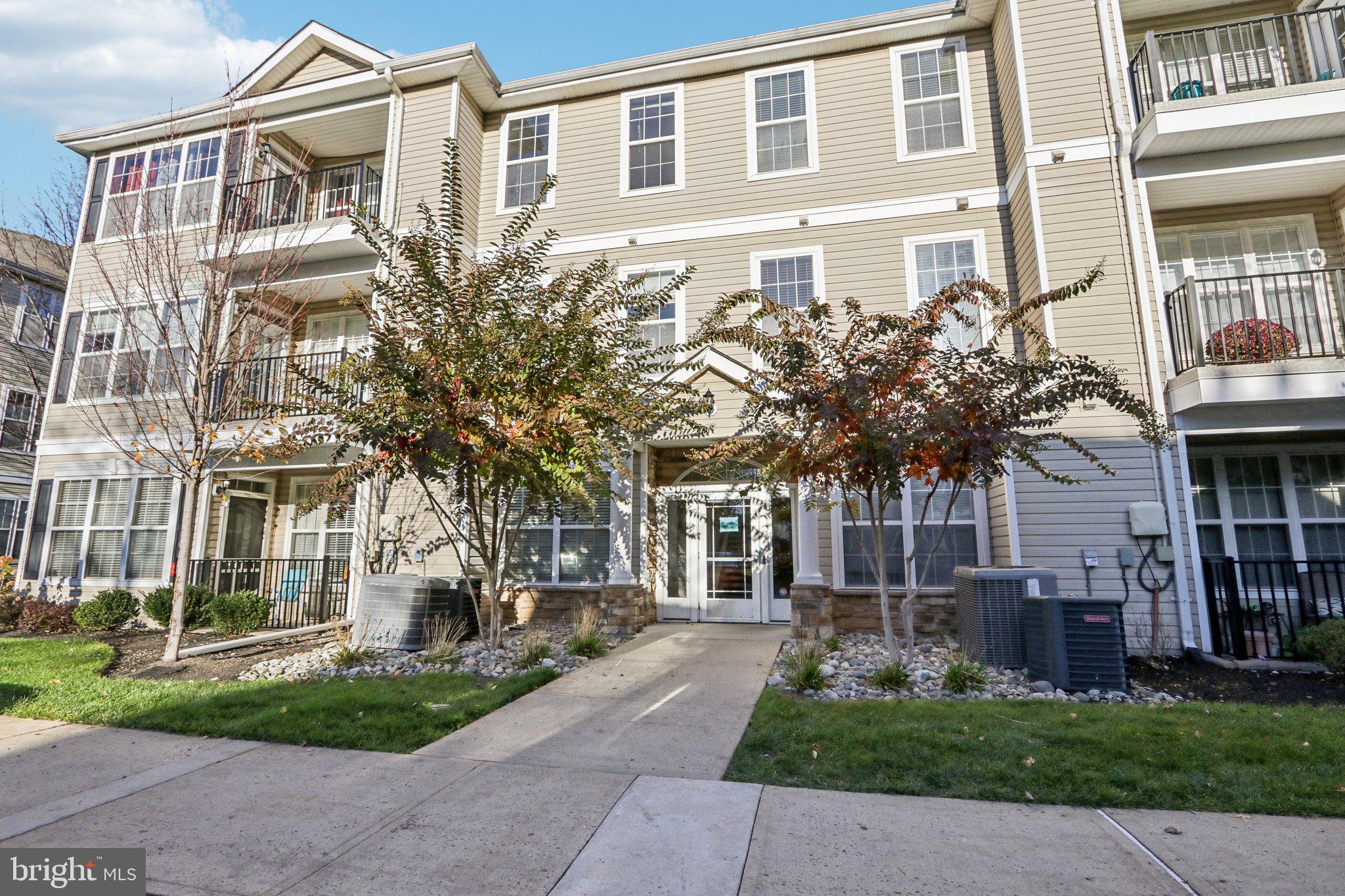 113 Kyle Way Ewing, NJ 08628 - Photo 3 of 42 front view of house with a yard