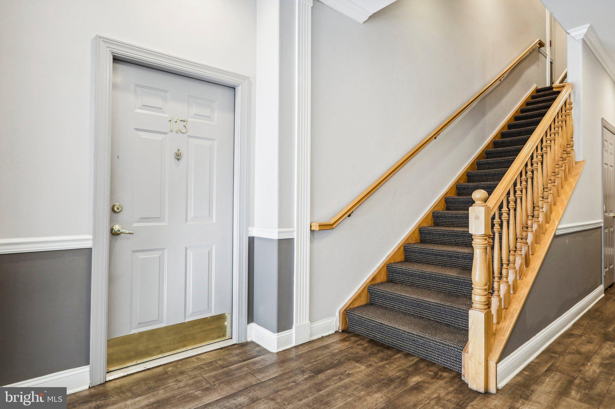 113 Kyle Way Ewing, NJ 08628 - Photo 4 of 42 a view of entryway and gallery with wooden floor