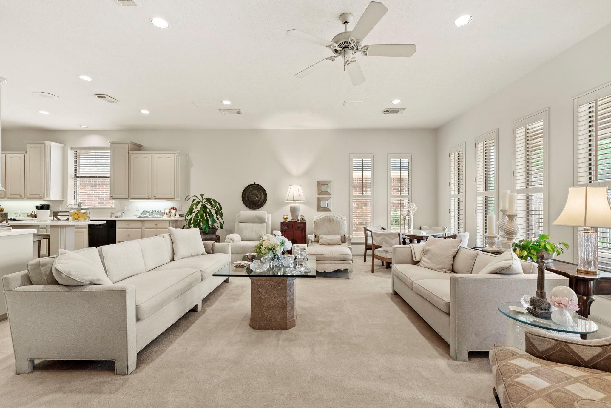 4513 Country Club View Baytown, TX 77521 - Photo 12 of 46 a living room with furniture white walls and white walls