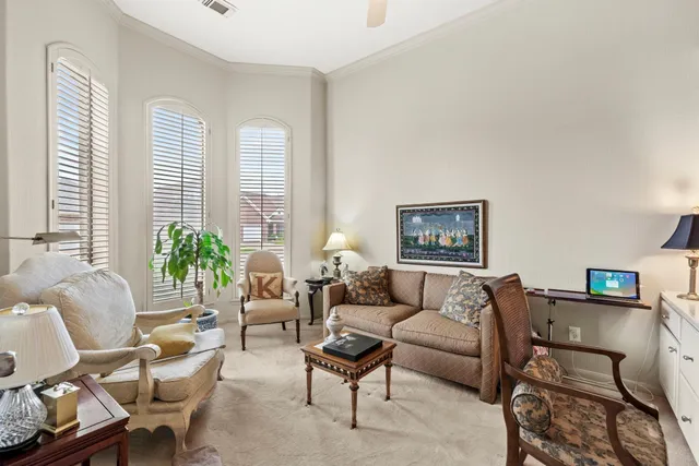 a view of a livingroom with furniture and front door