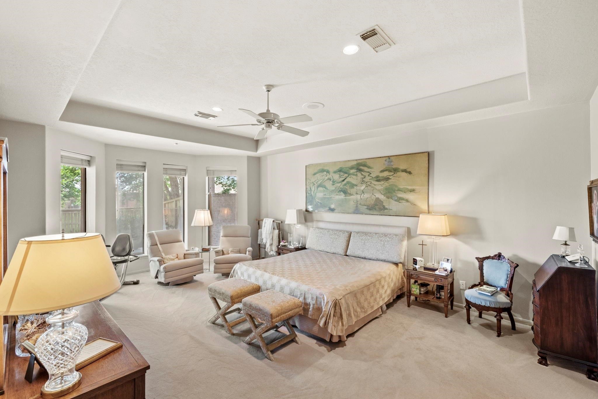 4513 Country Club View Baytown, TX 77521 - Photo 22 of 46 a spacious bedroom with a bed and window