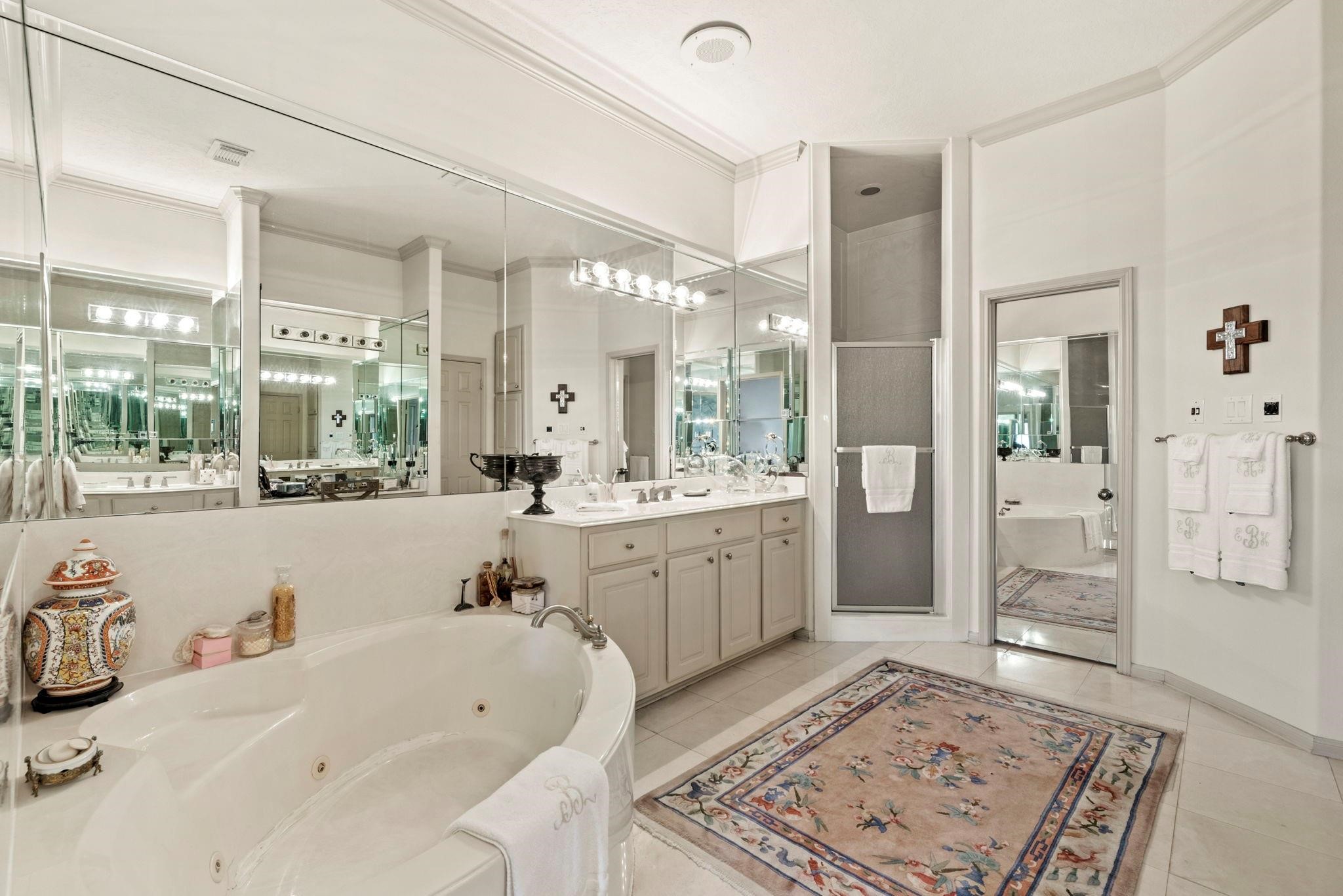 4513 Country Club View Baytown, TX 77521 - Photo 25 of 46 a bathroom with a tub sink and mirror