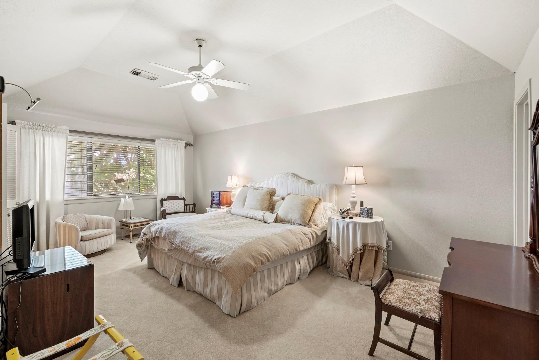 4513 Country Club View Baytown, TX 77521 - Photo 31 of 46 a bedroom with a bed and window