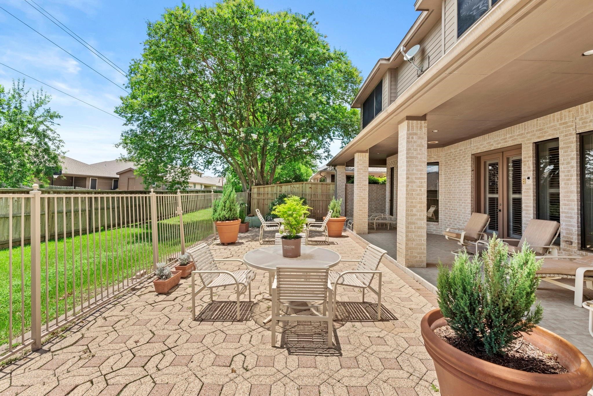 4513 Country Club View Baytown, TX 77521 - Photo 45 of 46 a view of a house with backyard and sitting area