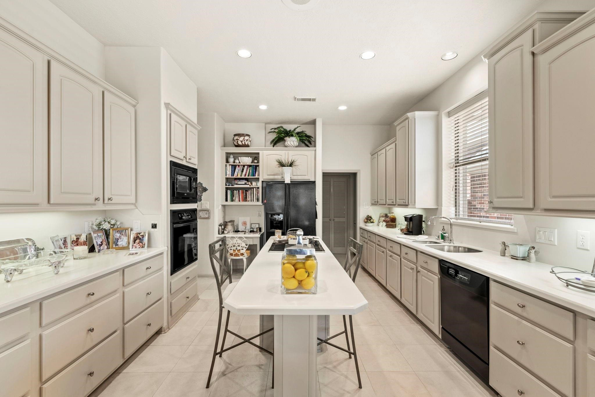 4513 Country Club View Baytown, TX 77521 - Photo 8 of 46 a very nice looking kitchen with cabinets
