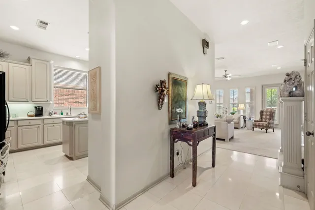 a living room with furniture white walls and white walls