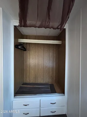 an entryway with a rug