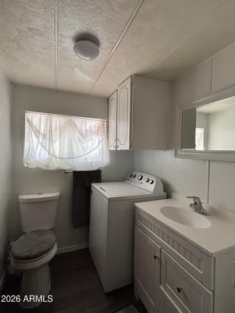 a bathroom with a toilet and a bathtub