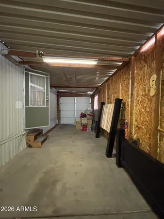 a view of a house with a small yard