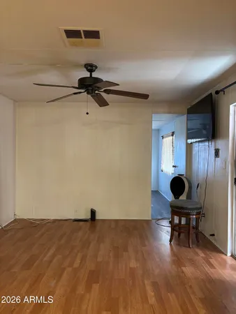 a kitchen with granite countertop a stove and a refrigerator