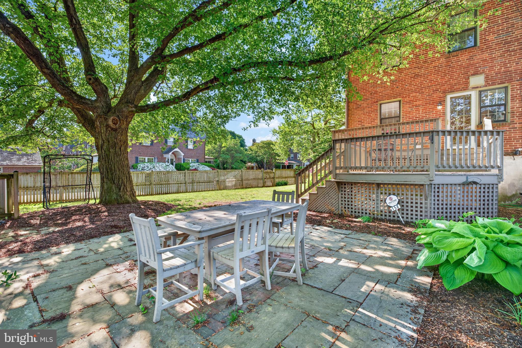 158 Hopkins Road Baltimore, MD 21212 - Photo 54 of 68 Charming patio under a leafy canopy.