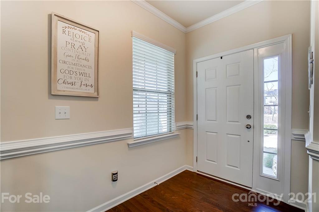 237 Butterfly Place, Unit 198 Tega Cay, SC 29708 - Photo 3 of 26 a view of an empty room with closet and a window