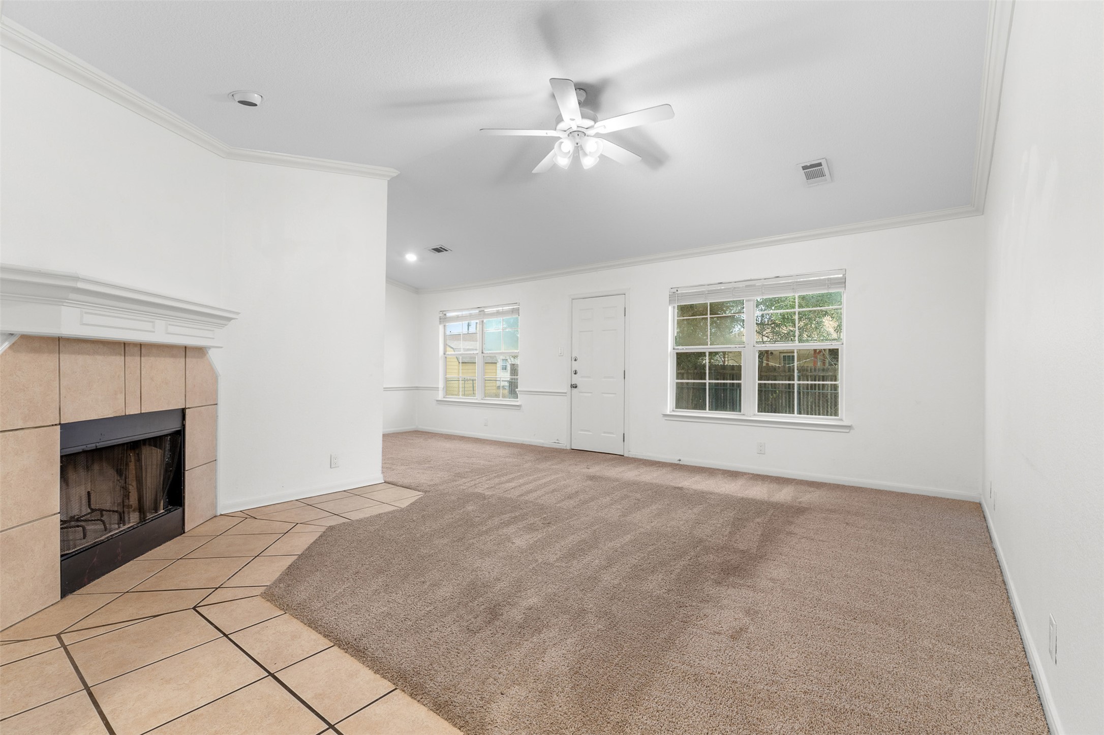 2602 Peach Tree Lane Cedar Park, TX 78613 - Photo 3 of 14 Living room featuring a fireplace.