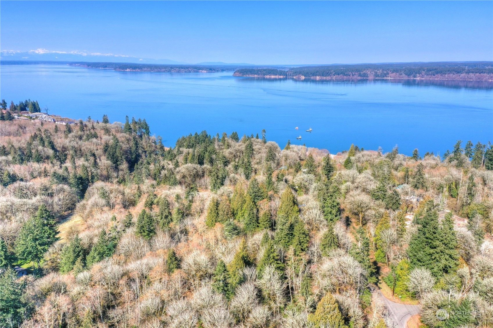 4841 Meridian Road Northeast Olympia, WA 98516 - Photo 9 of 9 a view of a large body of water with a building in the background