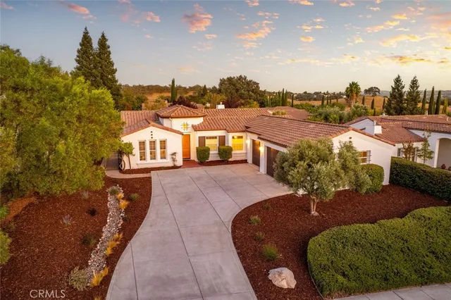 a view of a houses with a swimming pool