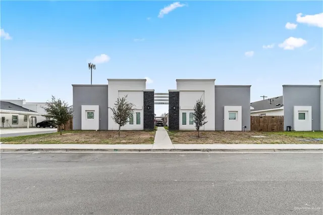 a view of street with houses