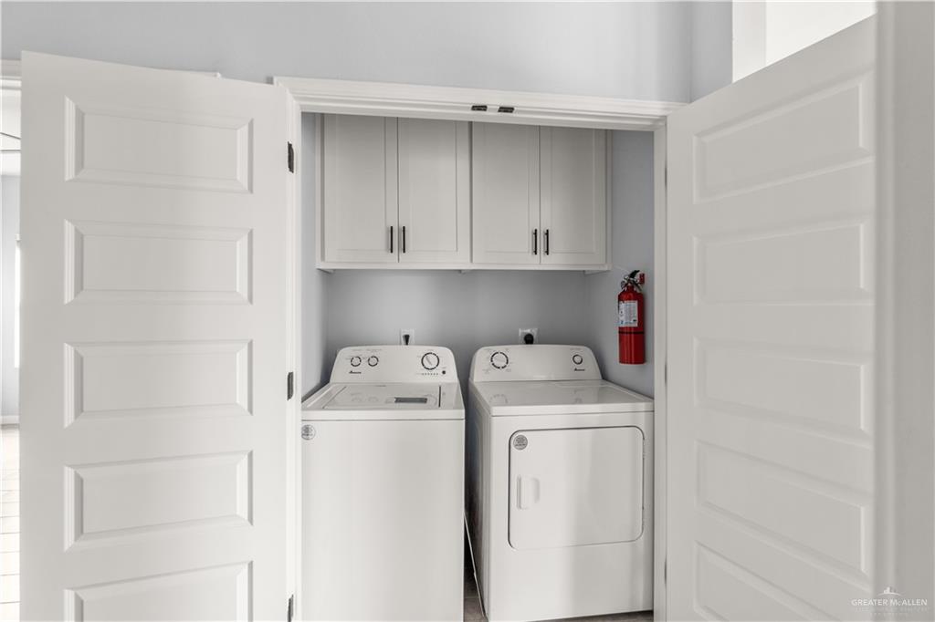 11018 North 33rd Lane, Unit 2 McAllen, TX 78504 - Photo 12 of 17 a utility room with dryer and washer