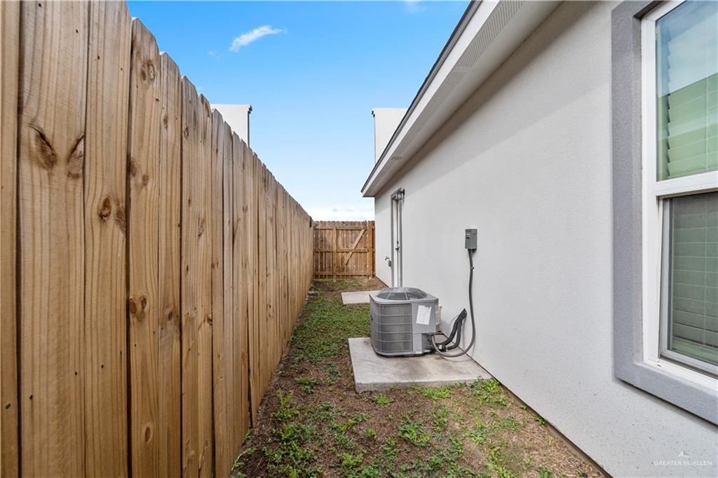 11018 North 33rd Lane, Unit 2 McAllen, TX 78504 - Photo 15 of 17 a view of back yard of the house
