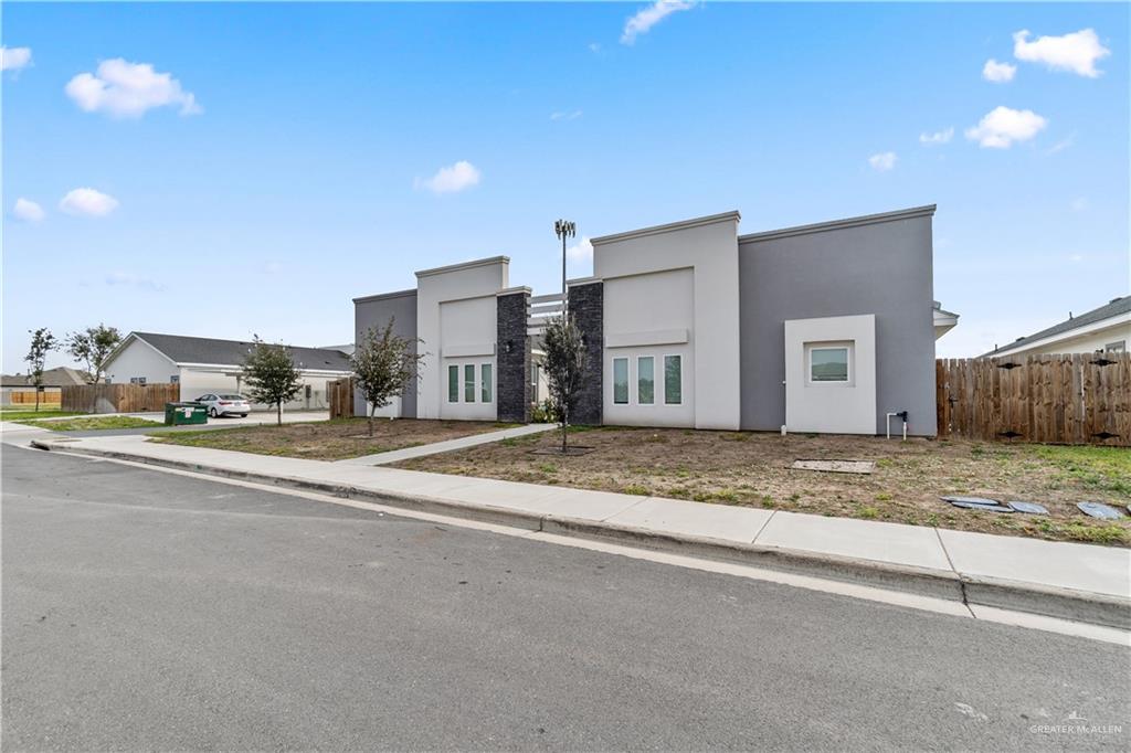 11018 North 33rd Lane, Unit 2 McAllen, TX 78504 - Photo 2 of 17 a view of a house with a yard