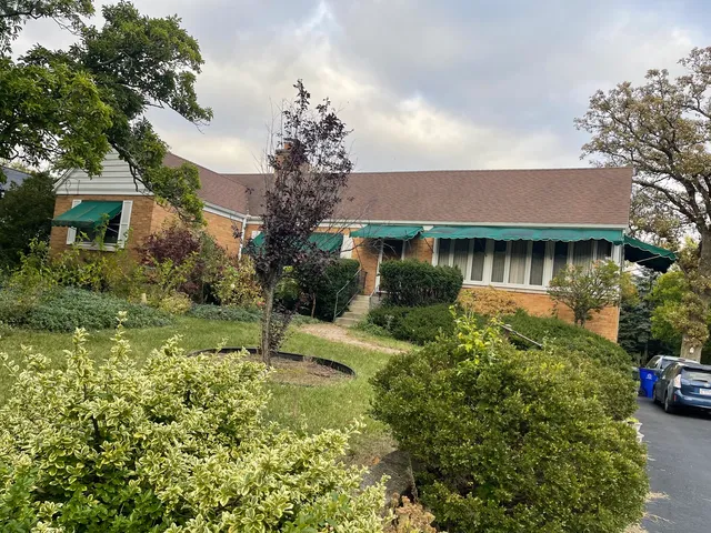 a backyard of a house with lots of green space