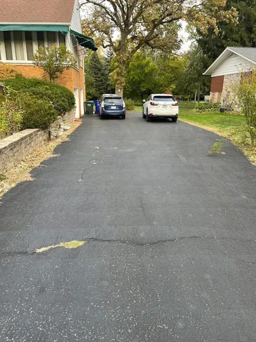 a car parked in front of a house