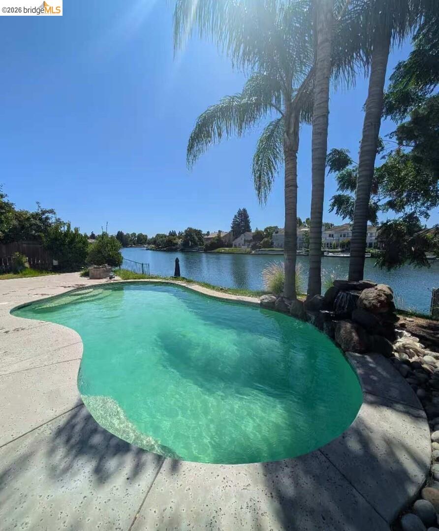 4958 Bay View Circle Stockton, CA 95219 - Photo 23 of 24 swimming pool featuring a water view