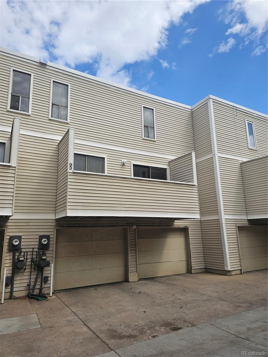 1050 South Monaco Parkway, Unit 93 Denver, CO 80224 - Photo 2 of 20 a view of a house with many windows