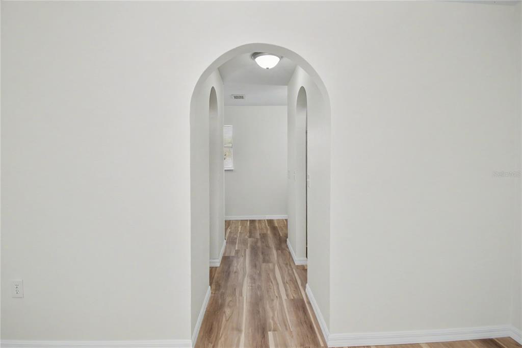 4948 Cromey Road North Port, FL 34288 - Photo 27 of 30 a view of a room with wooden floor