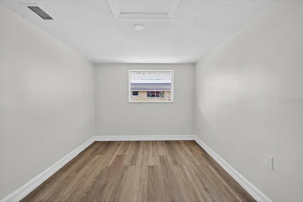 an empty room with a window
