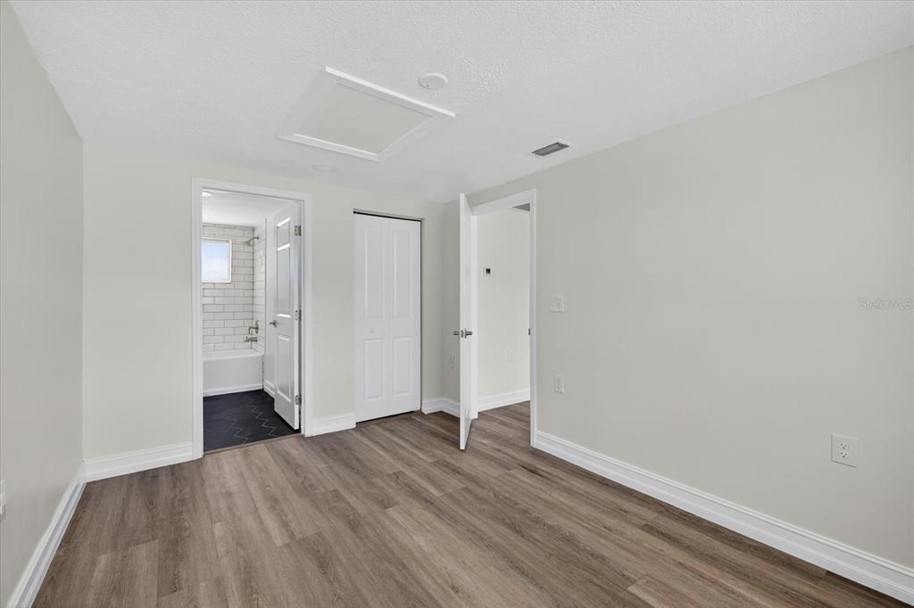 5409 Oceanic Road Holiday, FL 34690 - Photo 28 of 34 a view of an empty room with wooden floor