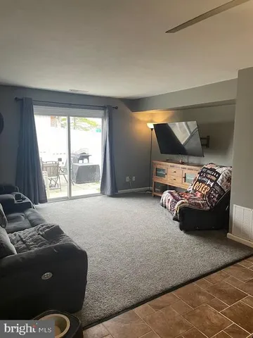 a bed room with a bed and a couch