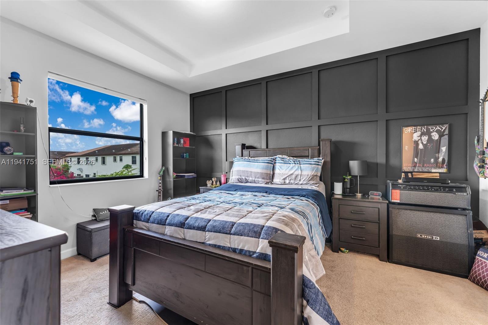 3763 Southeast 2nd Street Homestead, FL 33033 - Photo 11 of 48 a bedroom with a bed and a painting on the wall