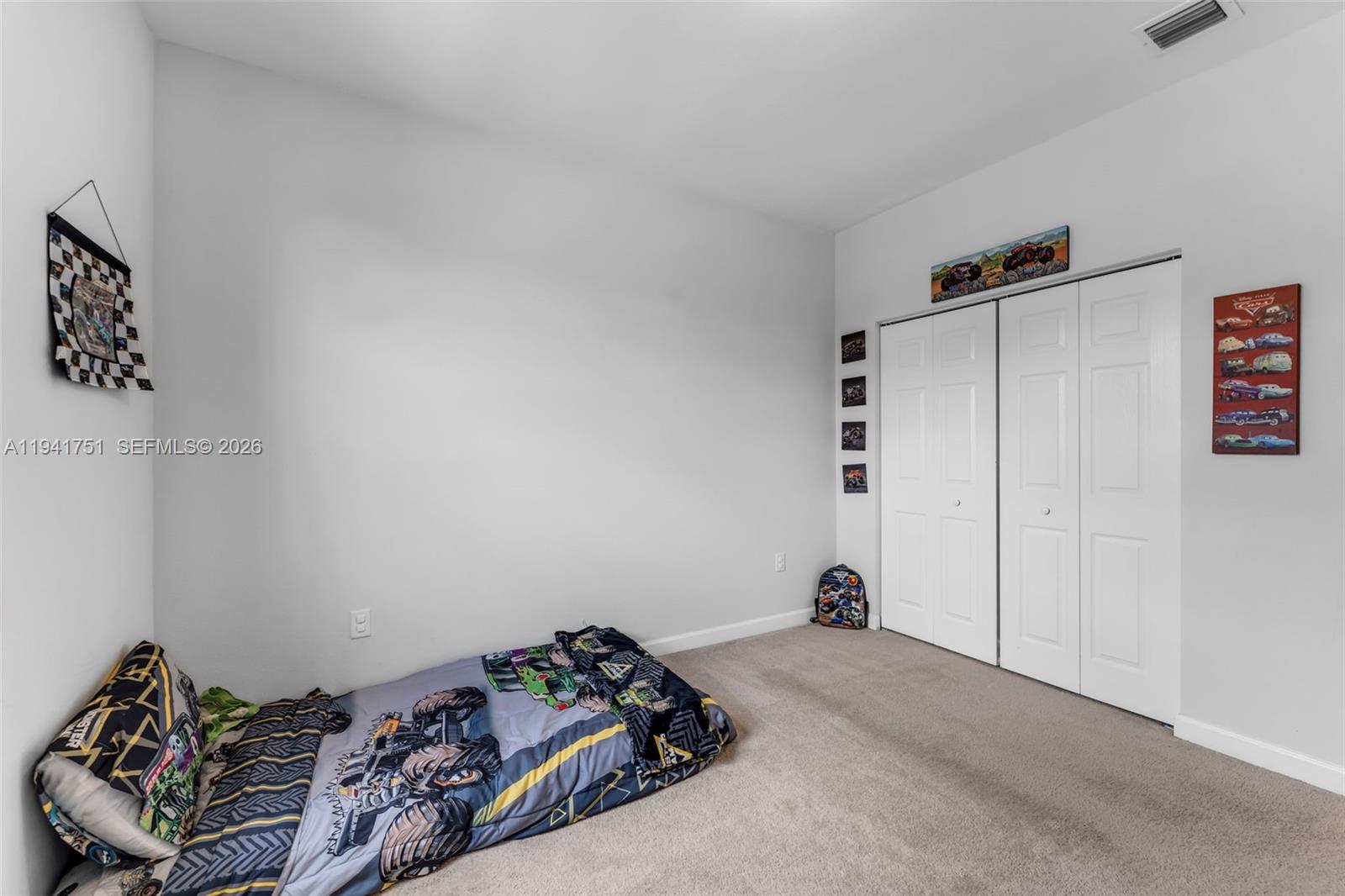 3763 Southeast 2nd Street Homestead, FL 33033 - Photo 16 of 48 a view of a livingroom with furniture and closet