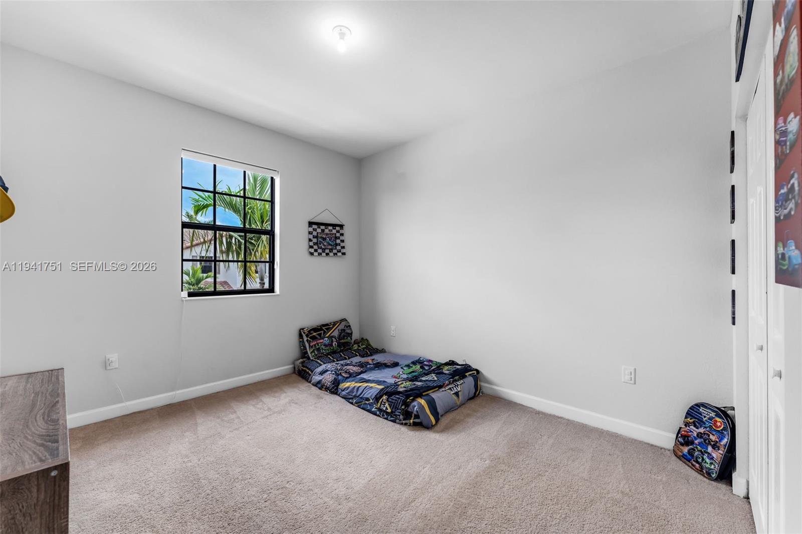 3763 Southeast 2nd Street Homestead, FL 33033 - Photo 17 of 48 an empty room with windows