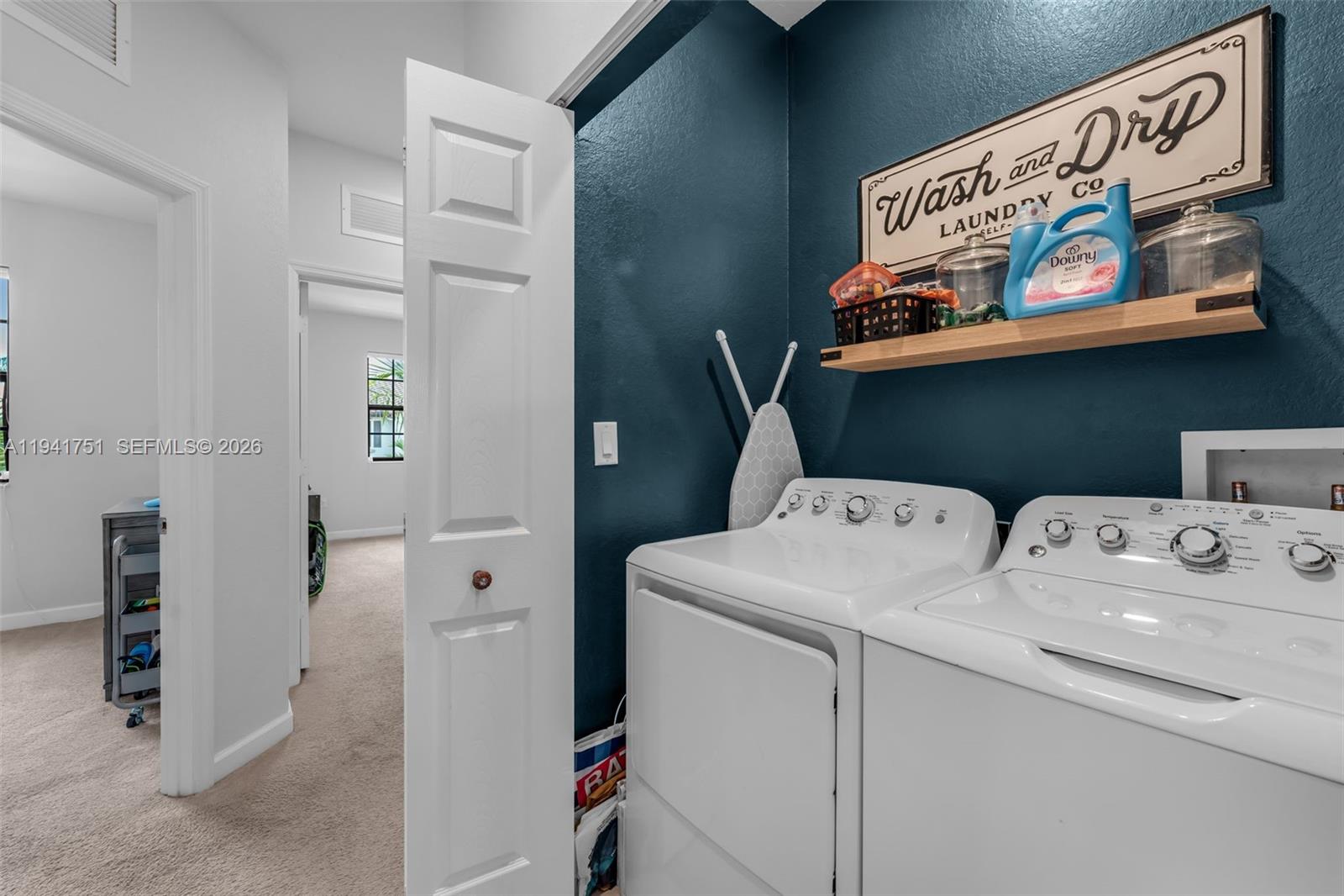 3763 Southeast 2nd Street Homestead, FL 33033 - Photo 21 of 48 a utility room with dryer and washer