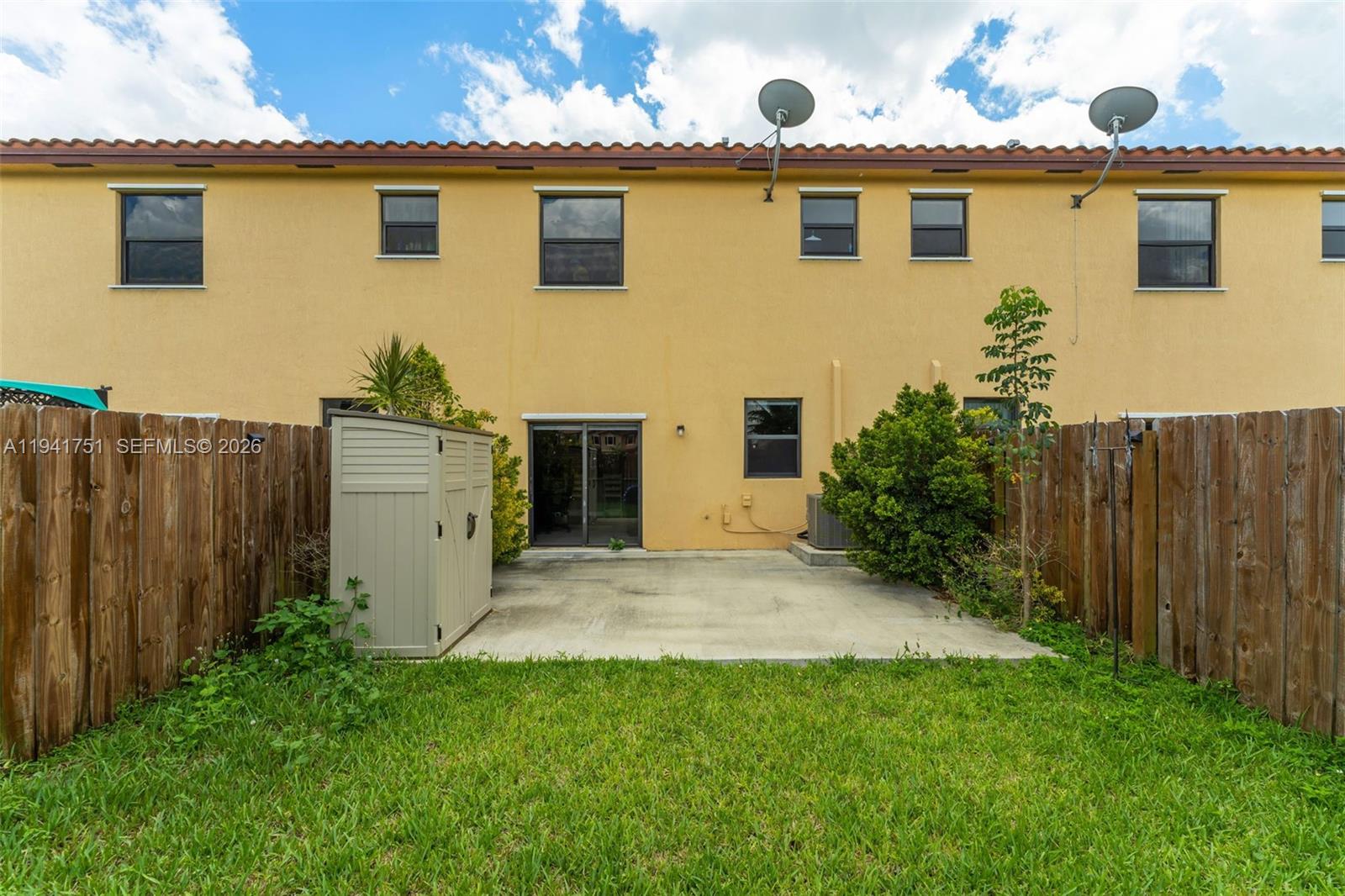 3763 Southeast 2nd Street Homestead, FL 33033 - Photo 23 of 48 a view of backyard with potted plants