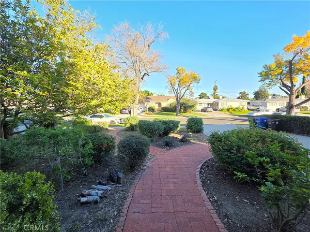a view of a yard with an outdoor space