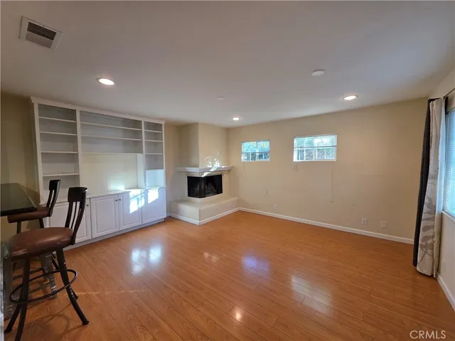 a view of livingroom with hardwood and furniture