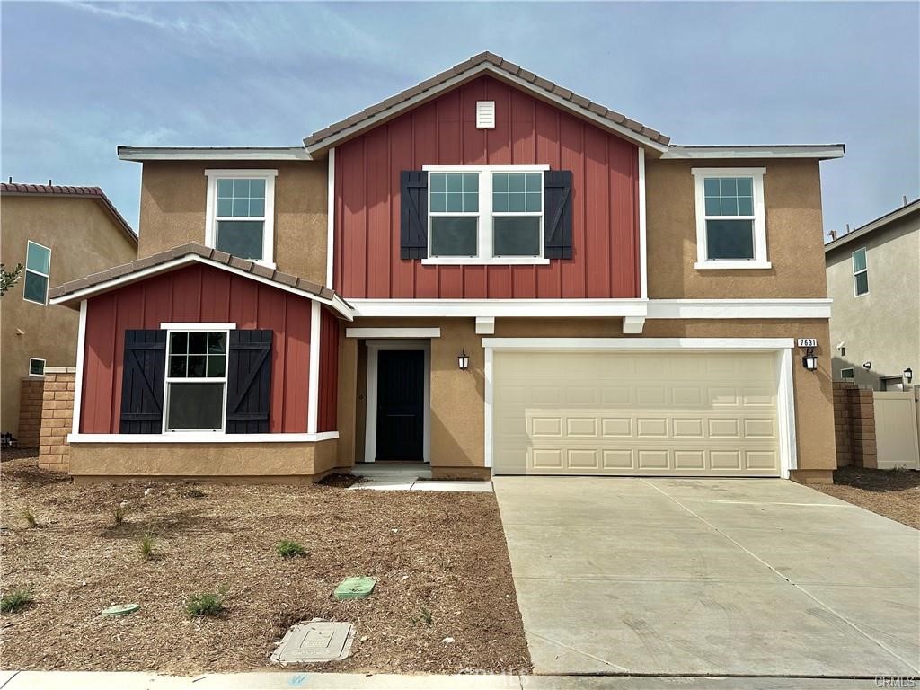 7631 Rubyred Gln Drive Riverside, CA 92507 - Photo 1 of 17 a view of a house with a yard
