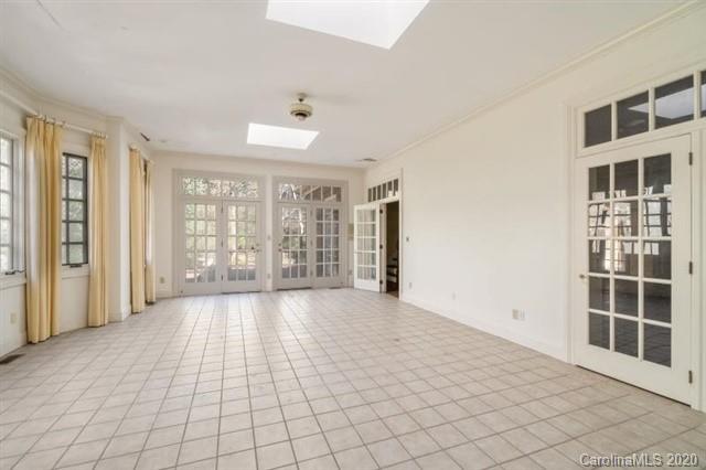 8355 Providence Road Charlotte, NC 28270 - Photo 17 of 36 a view of an empty room with windows