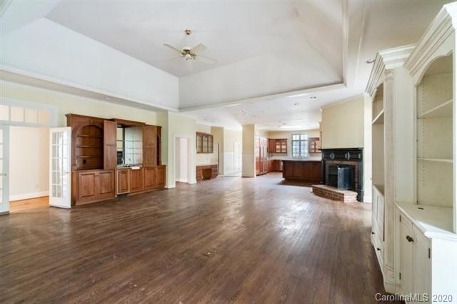 8355 Providence Road Charlotte, NC 28270 - Photo 18 of 36 a view of a furniture and an empty room with wooden floor
