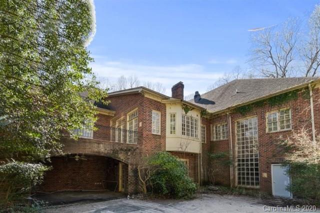 8355 Providence Road Charlotte, NC 28270 - Photo 29 of 36 a front view of a house with a garden