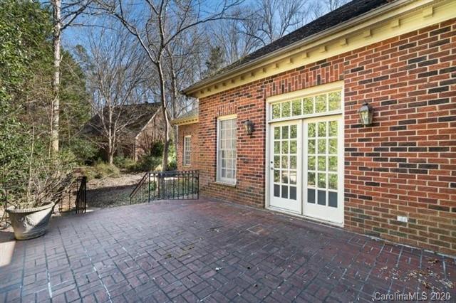 8355 Providence Road Charlotte, NC 28270 - Photo 30 of 36 a view of house with backyard