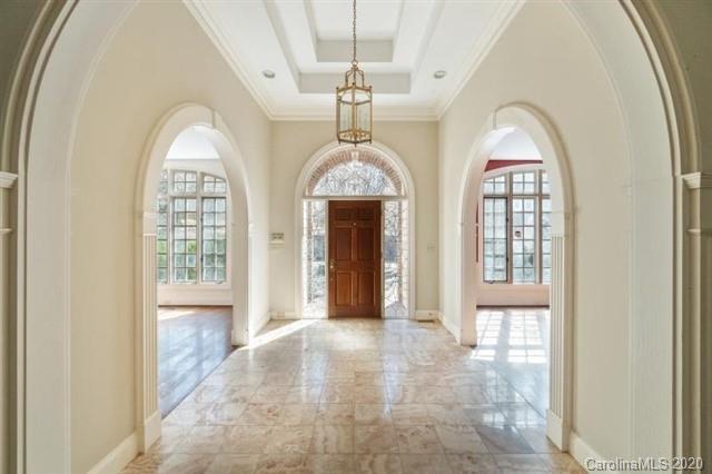 8355 Providence Road Charlotte, NC 28270 - Photo 4 of 36 a view of a hallway with windows