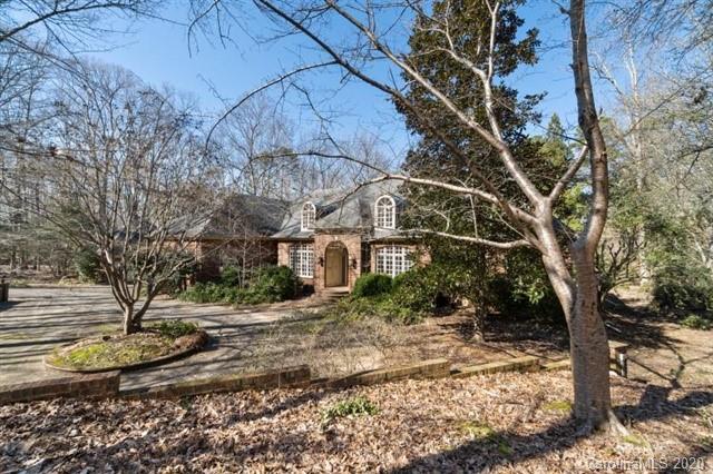 8355 Providence Road Charlotte, NC 28270 - Photo 31 of 36 a view of a house with a yard