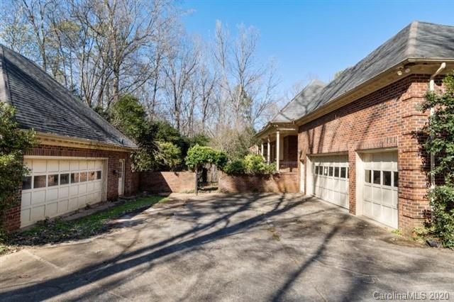 8355 Providence Road Charlotte, NC 28270 - Photo 32 of 36 a view of a house with a small yard