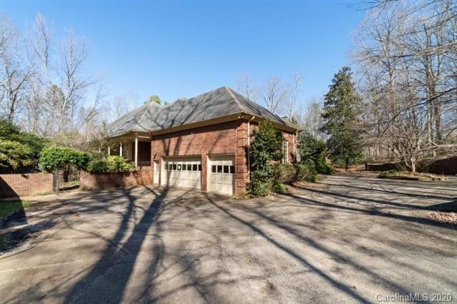 8355 Providence Road Charlotte, NC 28270 - Photo 33 of 36 a view of a house with a yard
