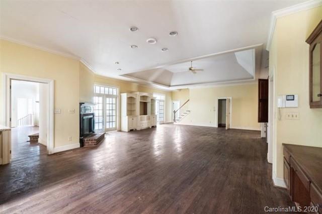 8355 Providence Road Charlotte, NC 28270 - Photo 7 of 36 a view of a livingroom with wooden floor